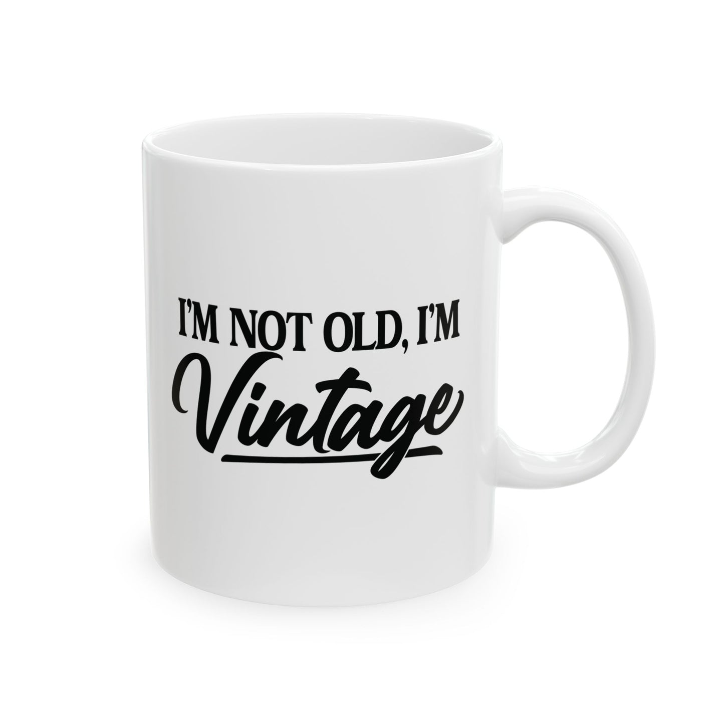White mug with 'I'm not old, I'm vintage' text on a white background